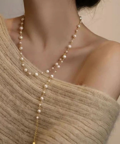 Elegant white pearl pendant necklace