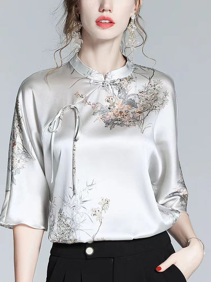 Printed silk half-sleeve blouse with stand-up collar and straps