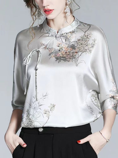 Printed silk half-sleeve blouse with stand-up collar and straps