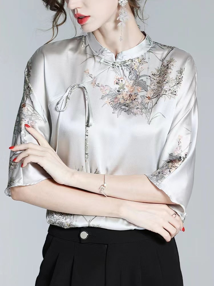 Printed silk half-sleeve blouse with stand-up collar and straps