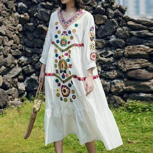 Embroidered V-neck cotton and linen beach hem dress